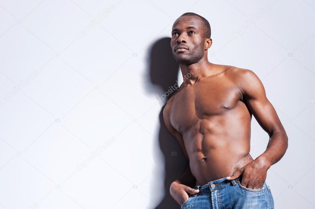 Handsome young shirtless African man