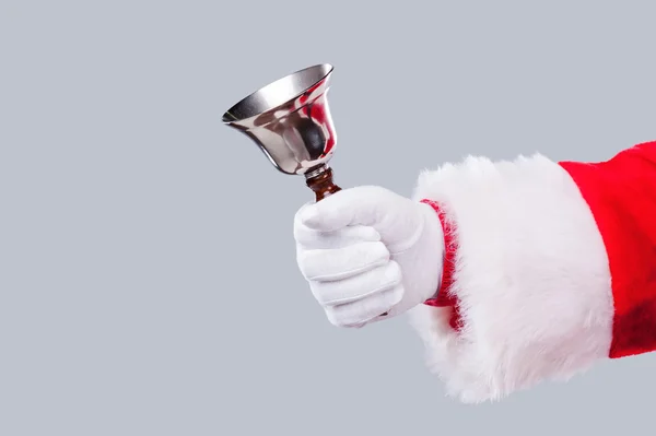 Santa Claus drží kovový zvon — Stock fotografie