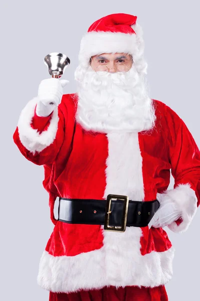 Santa claus ringer en klocka — Stockfoto