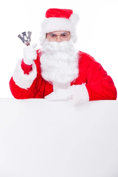 Santa claus ringer en klocka — Stockfoto