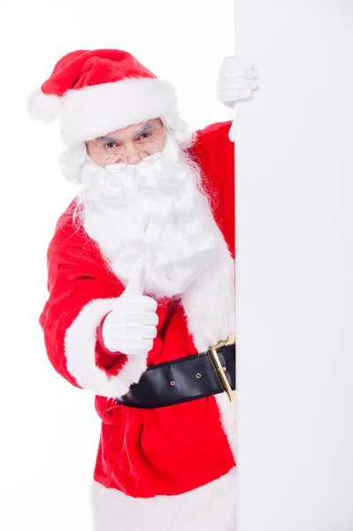 Santa Claus visar tummen — Stockfoto