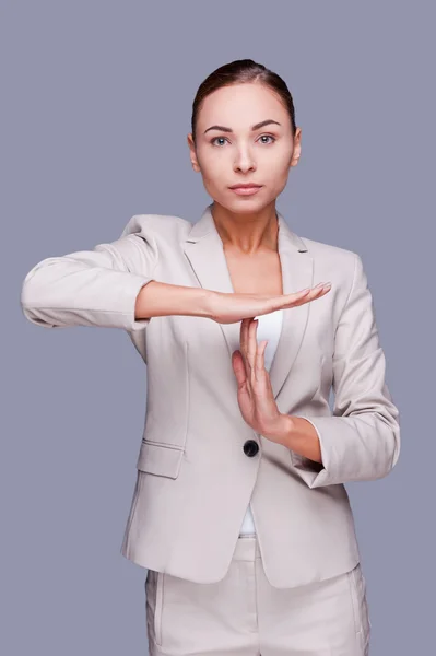 Businesswoman gesturing time out — Stock Photo, Image