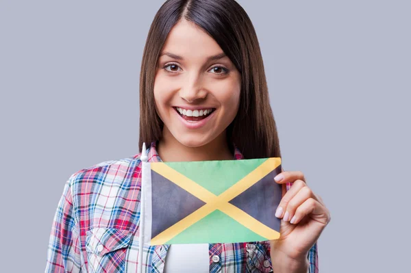 Mujer con bandera de Jamaica —  Fotos de Stock