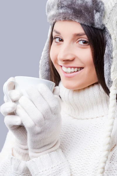 Woman wearing white gloves and drinking coffee — Stock Photo, Image