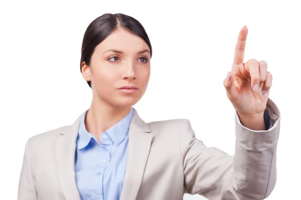 Businesswoman touching transparent wipe board — Stock Photo, Image