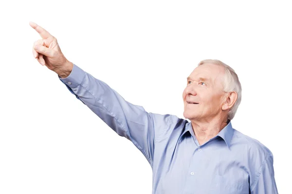 Senior man pointing away — Stock Photo, Image