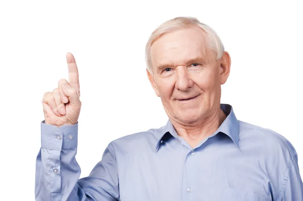 Senior man pointing up — Stock Photo, Image