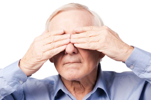 Senior man covering his eyes — Stock Photo, Image