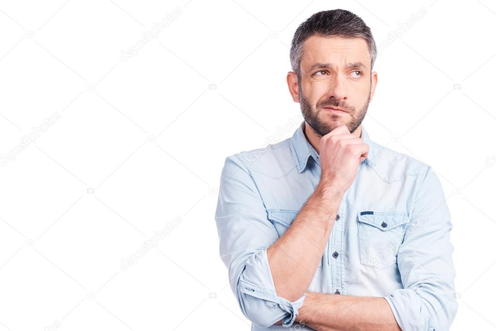 Frustrated young man in casual wear