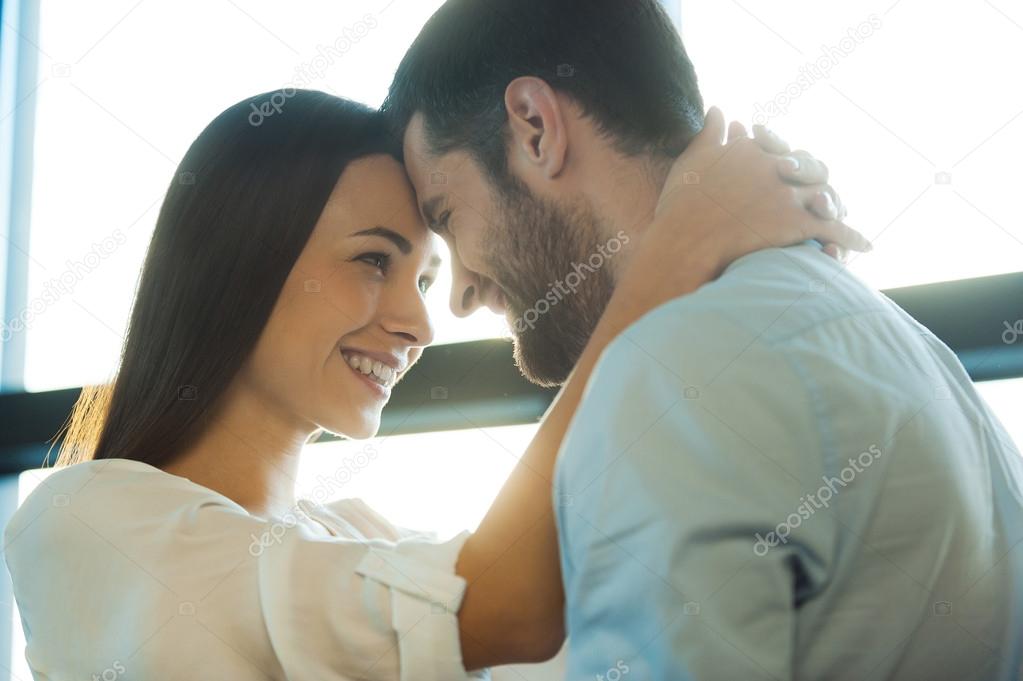 Woman embracing her boyfriend