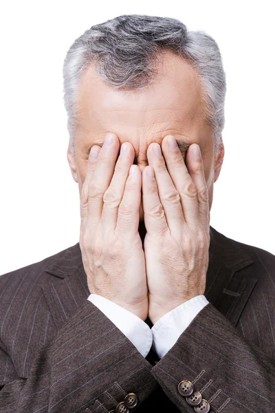 Frustrated mature man covering his face — Stock Photo, Image