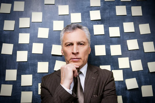 Thoughtful senior man in formalwear — Stock Photo, Image