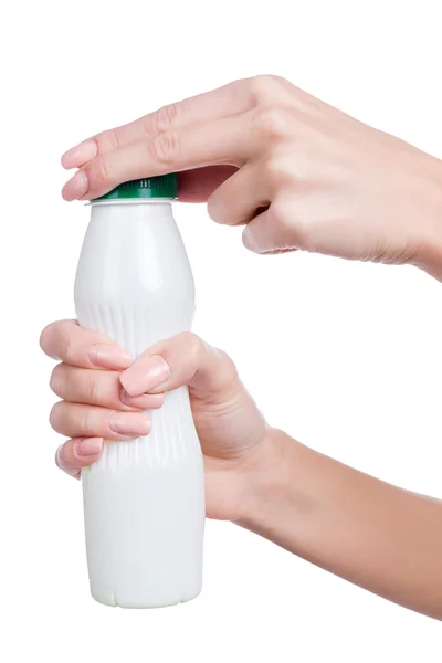 Woman holding white bottle with kefir — Stock Photo, Image