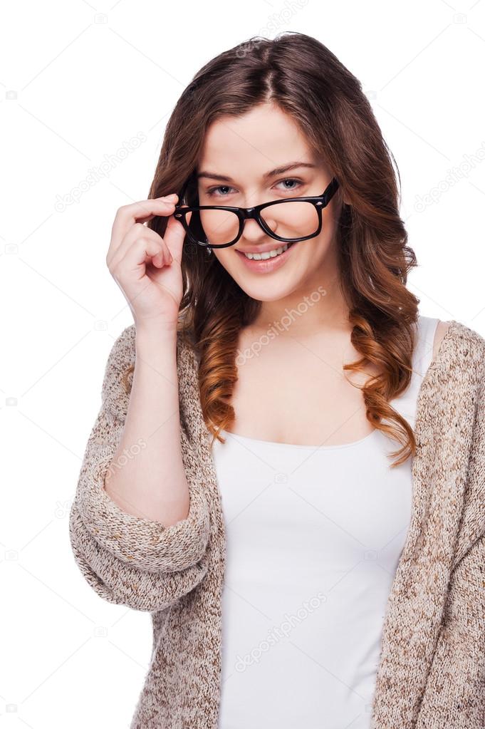 Smiling woman adjusting her eyeglasses