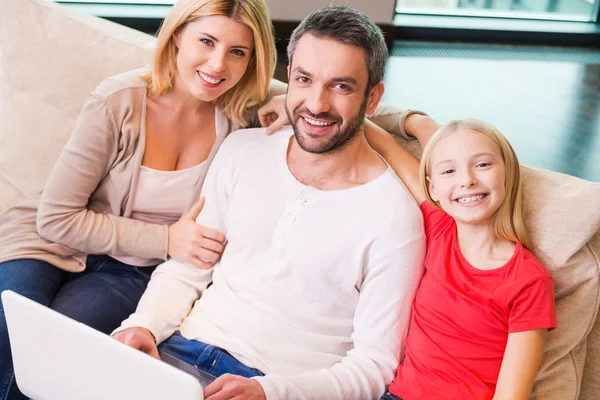 Happy family of three bonding to each other — Stock Photo, Image