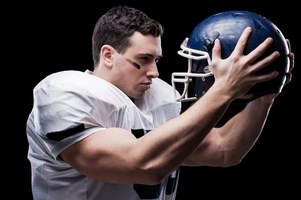 American football player holding helmet — Stock Photo, Image