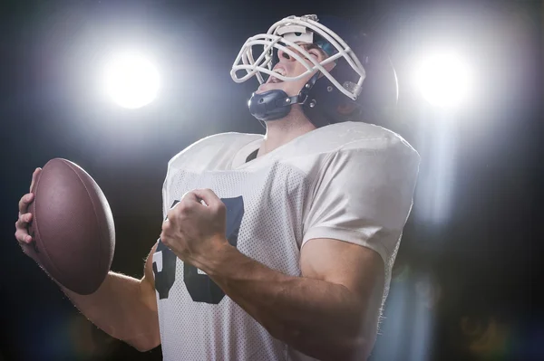 American football player  holding ball — Stock Photo, Image