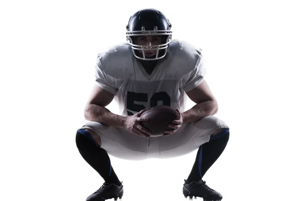 And wearing helmet while sitting against white bac — Stock Photo, Image