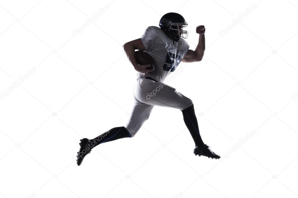 American football player jumping