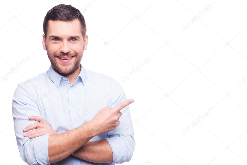 Man in shirt  pointing away