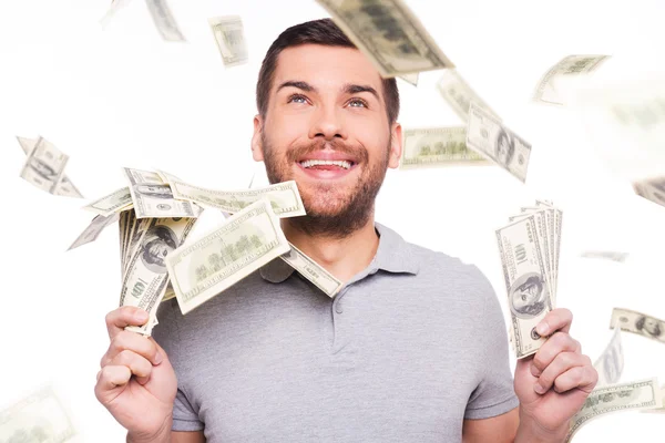 Pria bahagia memegang mata uang kertas — Stok Foto