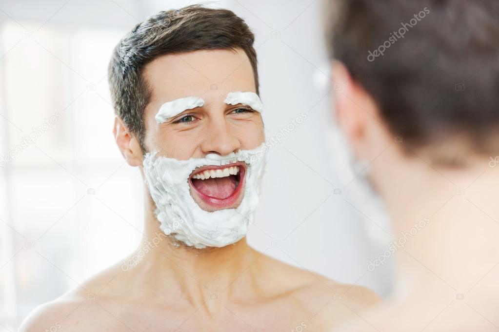 Man with shaving cream on face