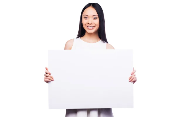 Asian woman holding copy space — Stock Photo, Image