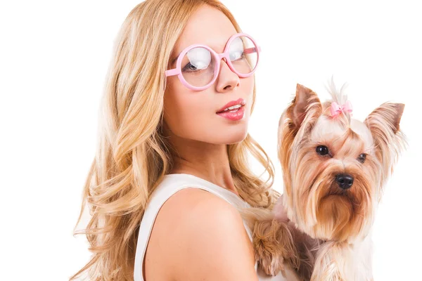 Blond woman carrying Yorkshire terrier — Stock Photo, Image