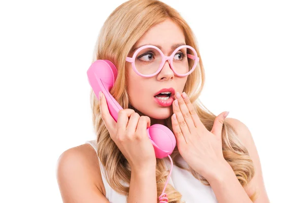 Frustrated woman talking on telephone — Stock Photo, Image