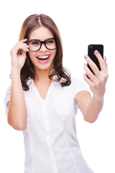 Woman making photo of herself — Stock Photo, Image