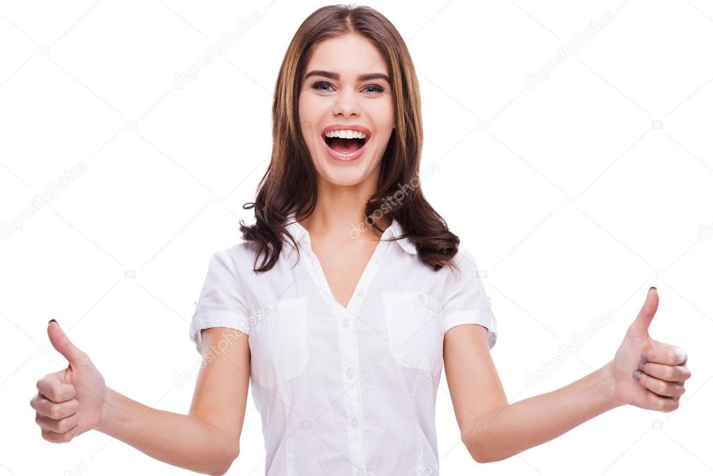 Woman showing her thumbs up