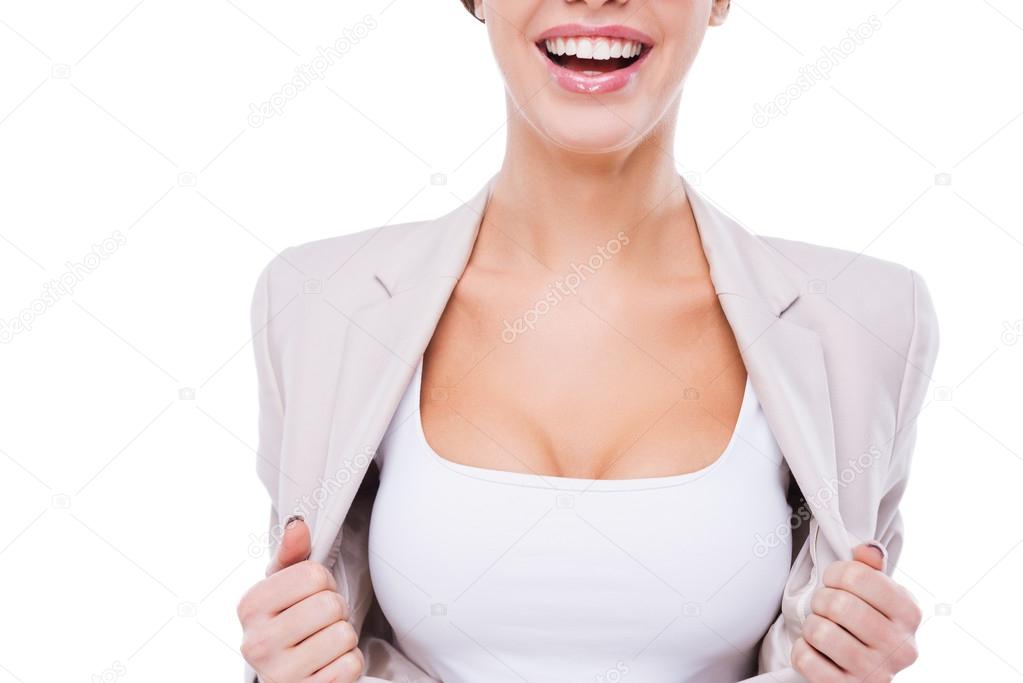 Businesswoman taking off her jacket