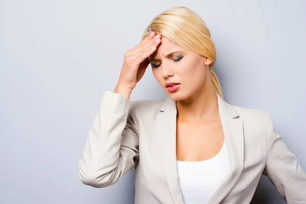 Depressed young businesswoman — Stock Photo, Image