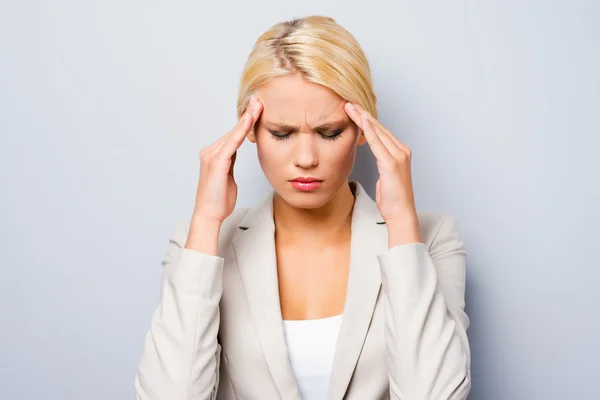 Depressed young businesswoman — Stock Photo, Image