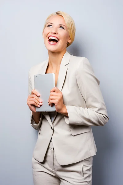 Businesswoman holding digital tablet — Stock Photo, Image