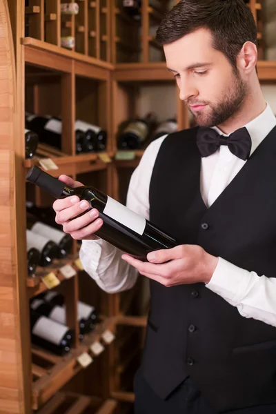 Man holding bottle with wine — Stock Photo, Image