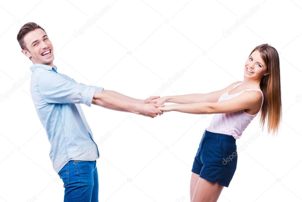 Loving couple holding hands