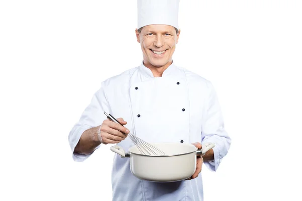 Chef mixing something in casserole — Stock Photo, Image