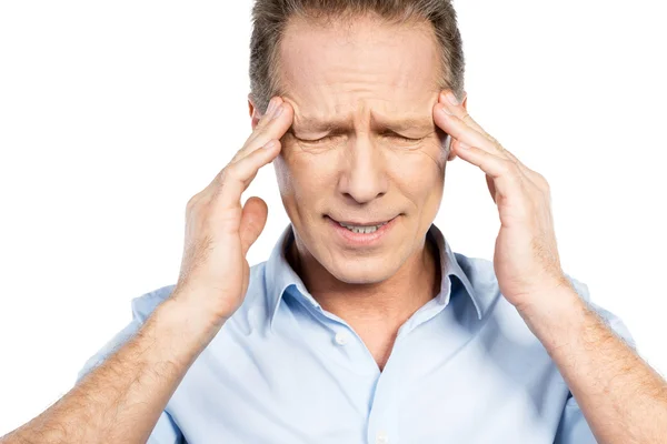 Frustrated mature man touching head — Stock Photo, Image