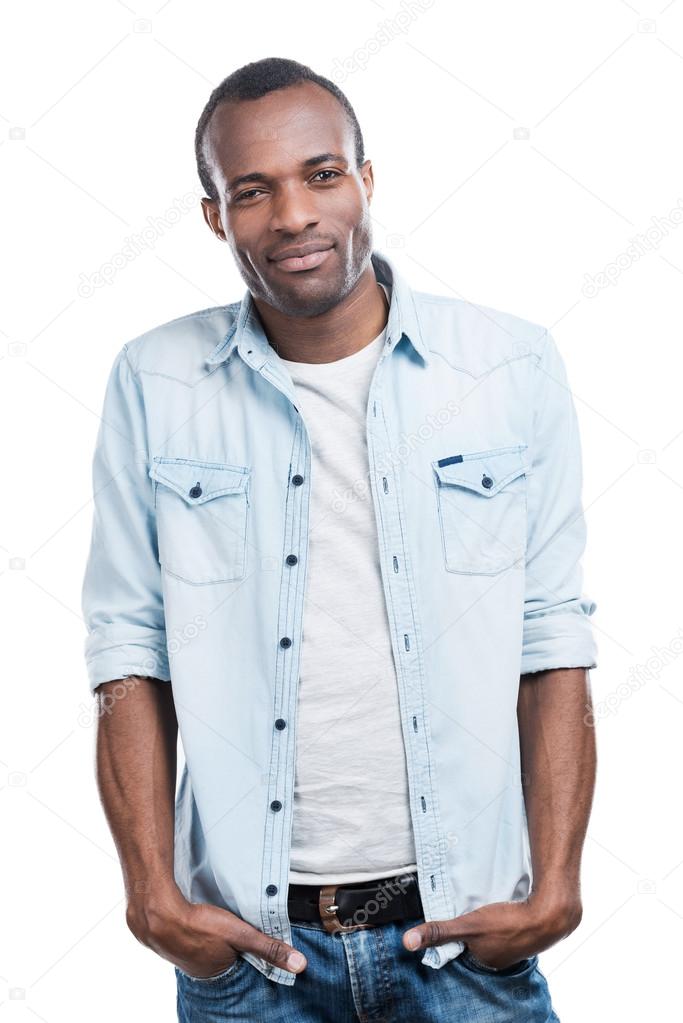 Black man holding hands in pockets