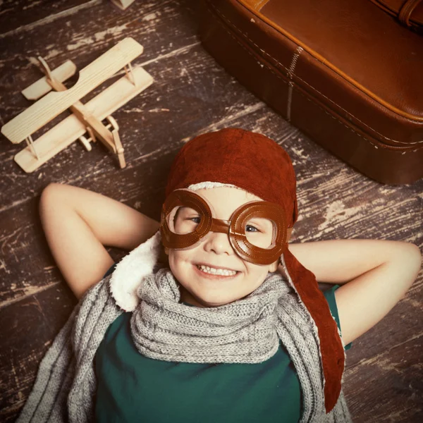 Little boy in pilot headwear and eyeglasses Stock Image