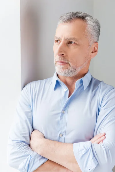 Thoughtful grey hair senior man — Stock Photo, Image