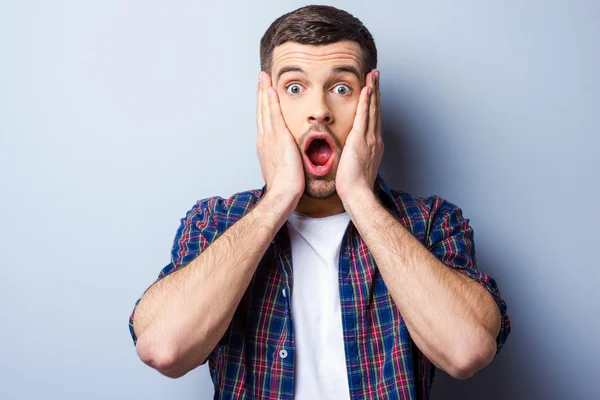 Frustrated man keeping mouth open — Stock Photo, Image