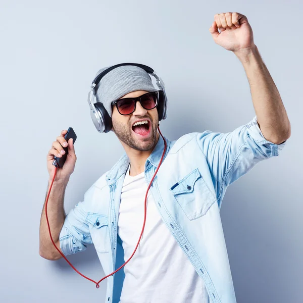 Young stylish man in headphones — Stock Photo, Image