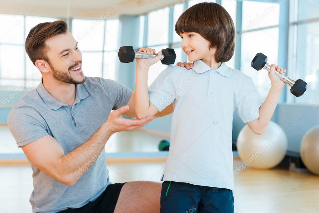 Father with son in health club