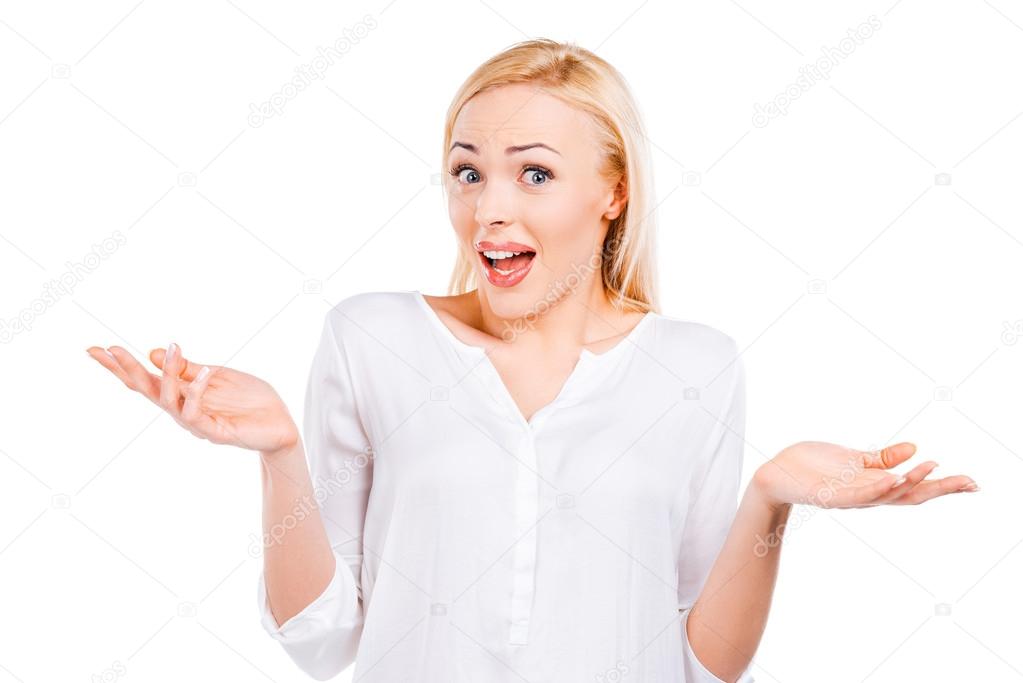 Surprised mature woman stretching out hands