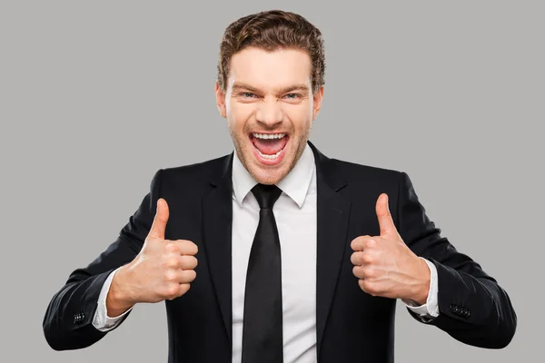 Man in formalwear showing his thumbs up — Stock Photo, Image