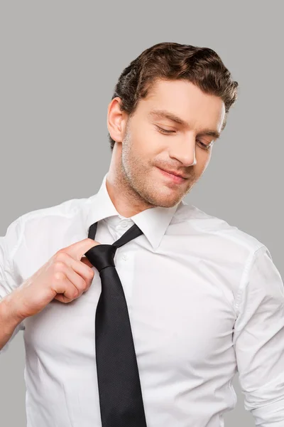 Frustrated young man in shirt and tie — Stock Photo, Image