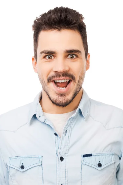 Surprised young man staring — Stock Photo, Image