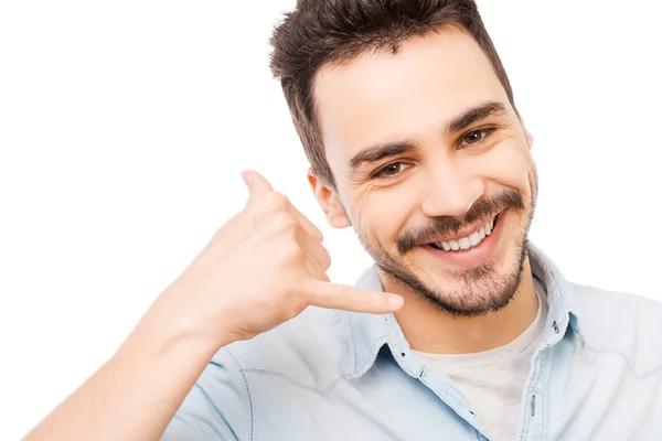 Hombre joven gesticulando teléfono móvil — Foto de Stock